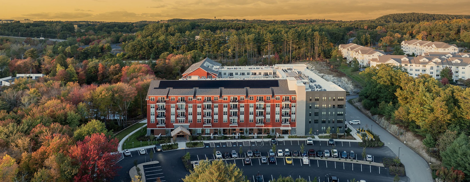 the lodge faq page image showing the building from a drone