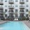 courtyard style pool and cabanas at one bedroom apartments at the lodge in marlboro ma