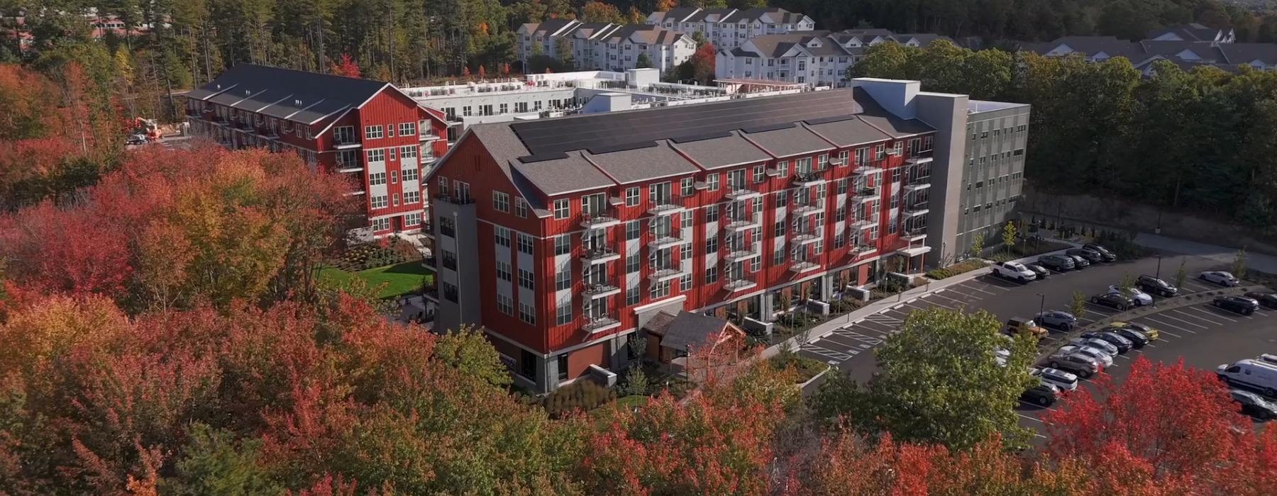 exterior of a building with a parking lot