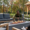 image of people around fireplace at the lodge apartments in marlboro ma